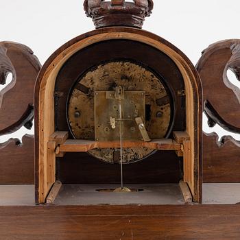 A mantel clock, early 20th Century.