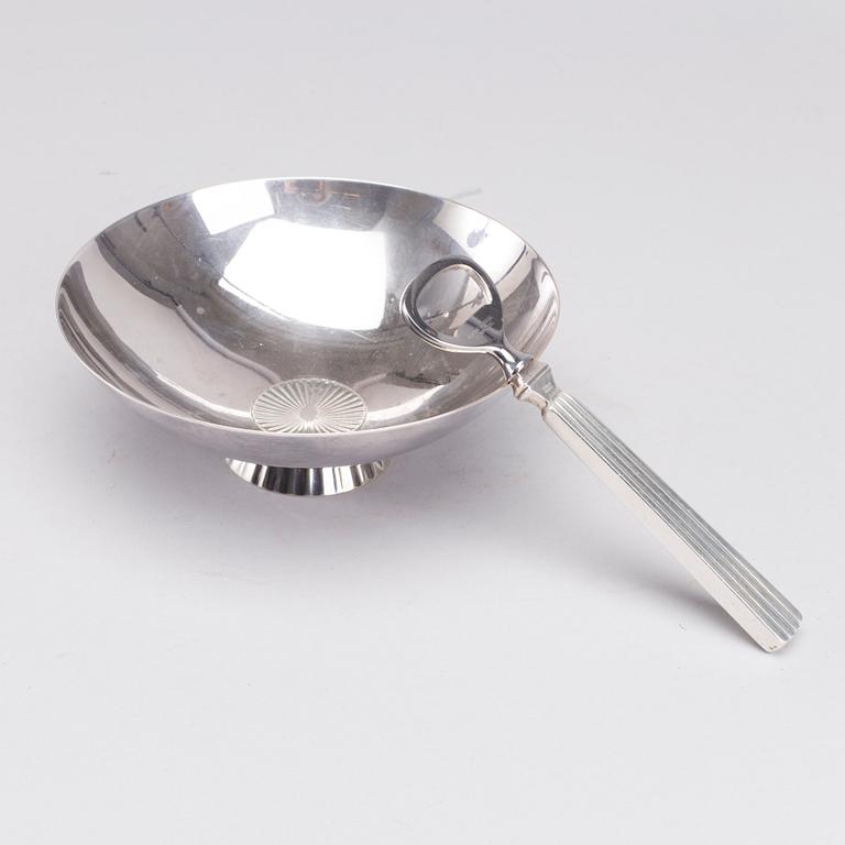 A Danish 20th century set of sterling silver bowl and opener, mark of S Bernadotte and G Jensen, weight ca 315 gr.