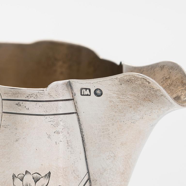 A silver cream jug, maker's mark Pavel Amerikantsev, Moscow 1908-26.