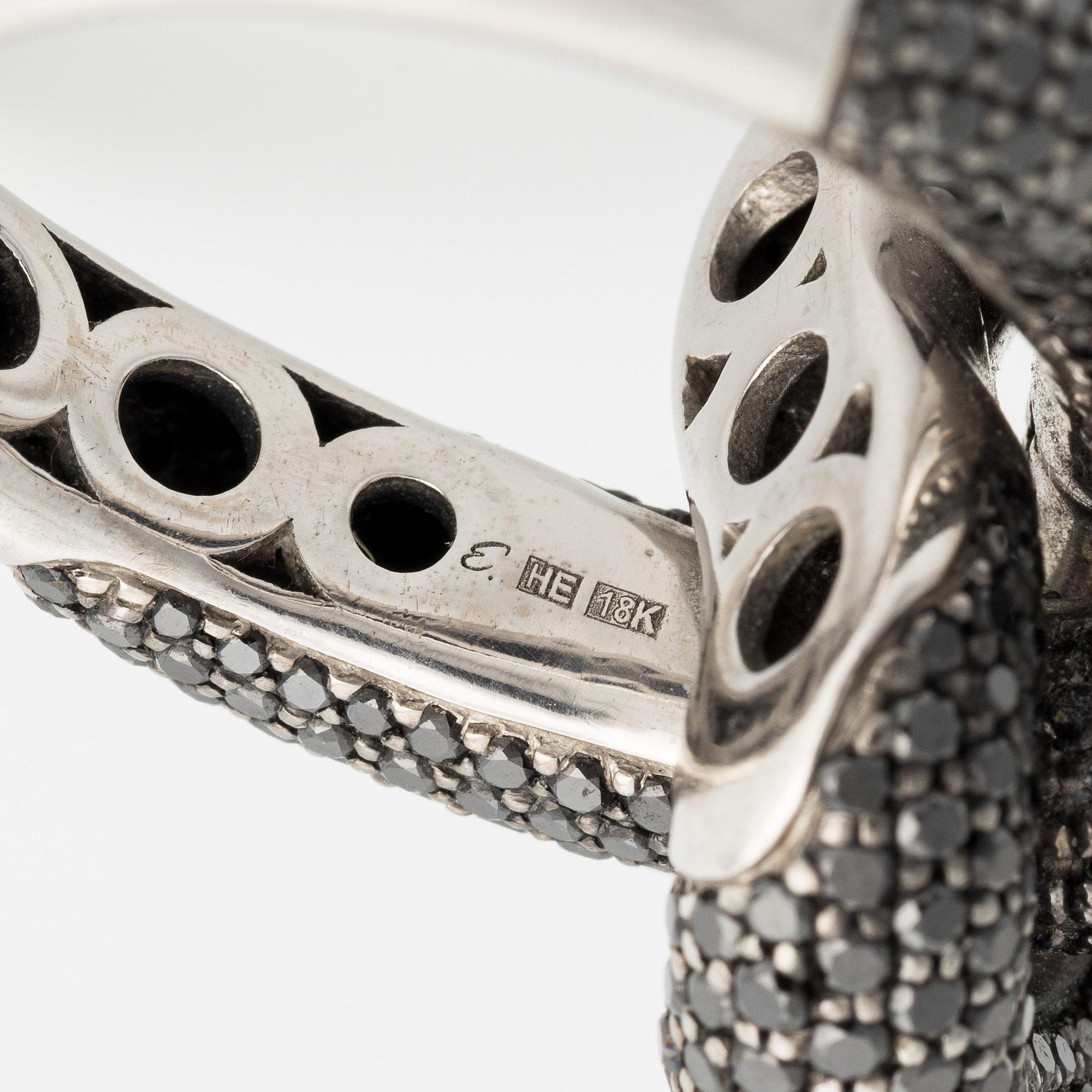 An Engelbert ring "The Legacy Knot" large, 18K white gold with black diamonds.
