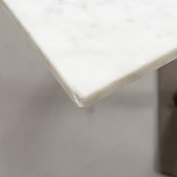 A marble top table, 21th century.