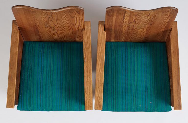 Axel Einar Hjorth, a pair of "Utö" stained pine armchairs, Nordiska Kompaniet 1930s.