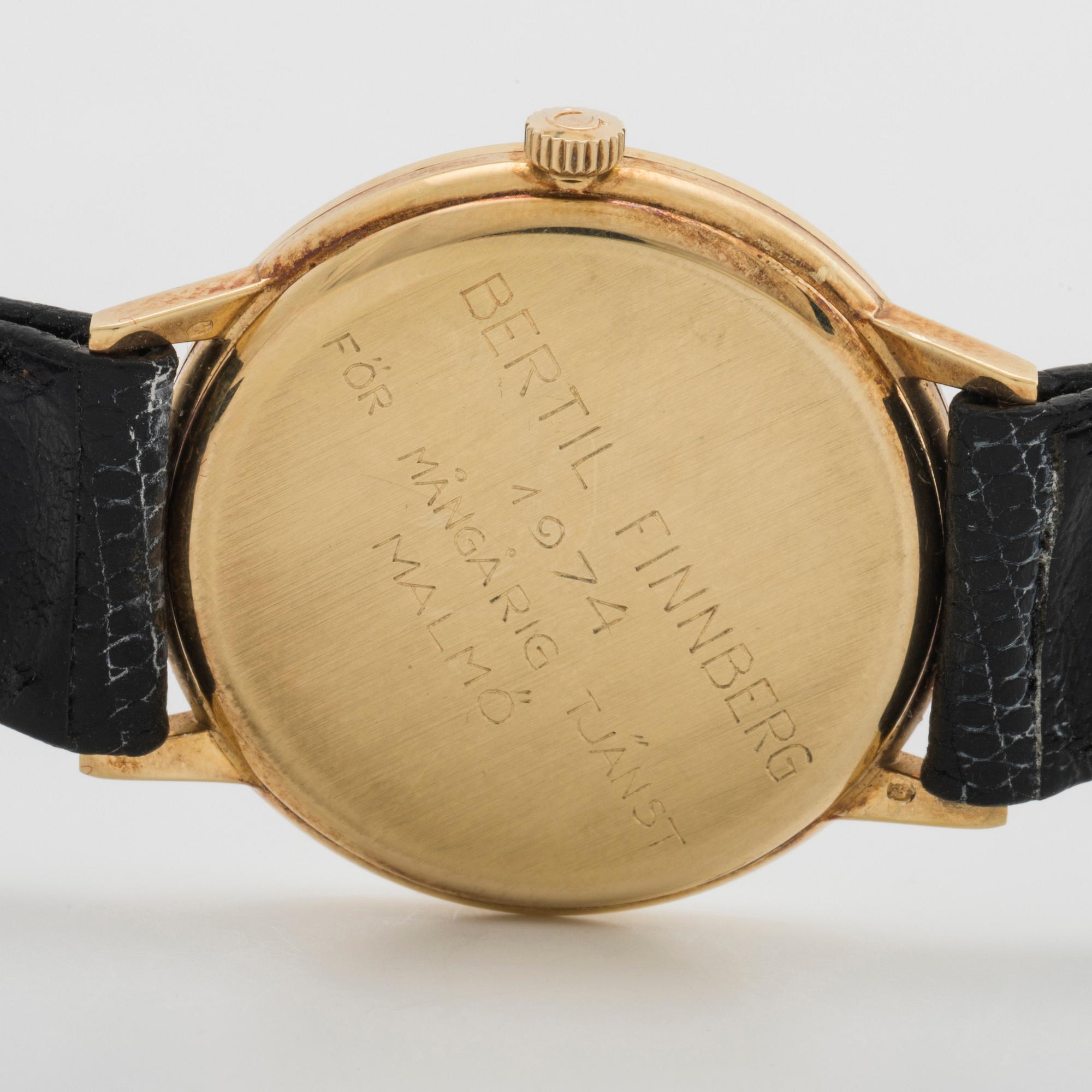 A 14 ct gold Omega Geneve wrist watch.