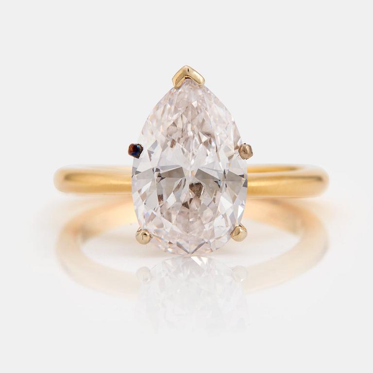 A pear cut diamond ring.