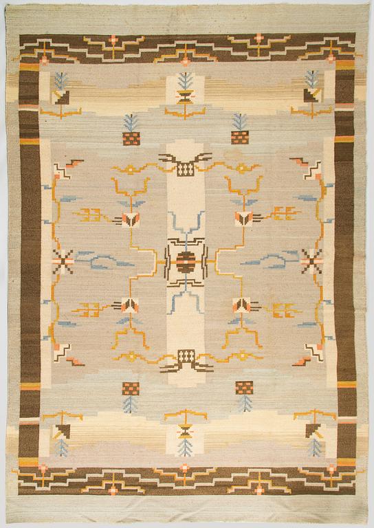 A 1930's Finnish flat weave carpet. Circa 350 x 246 cm.