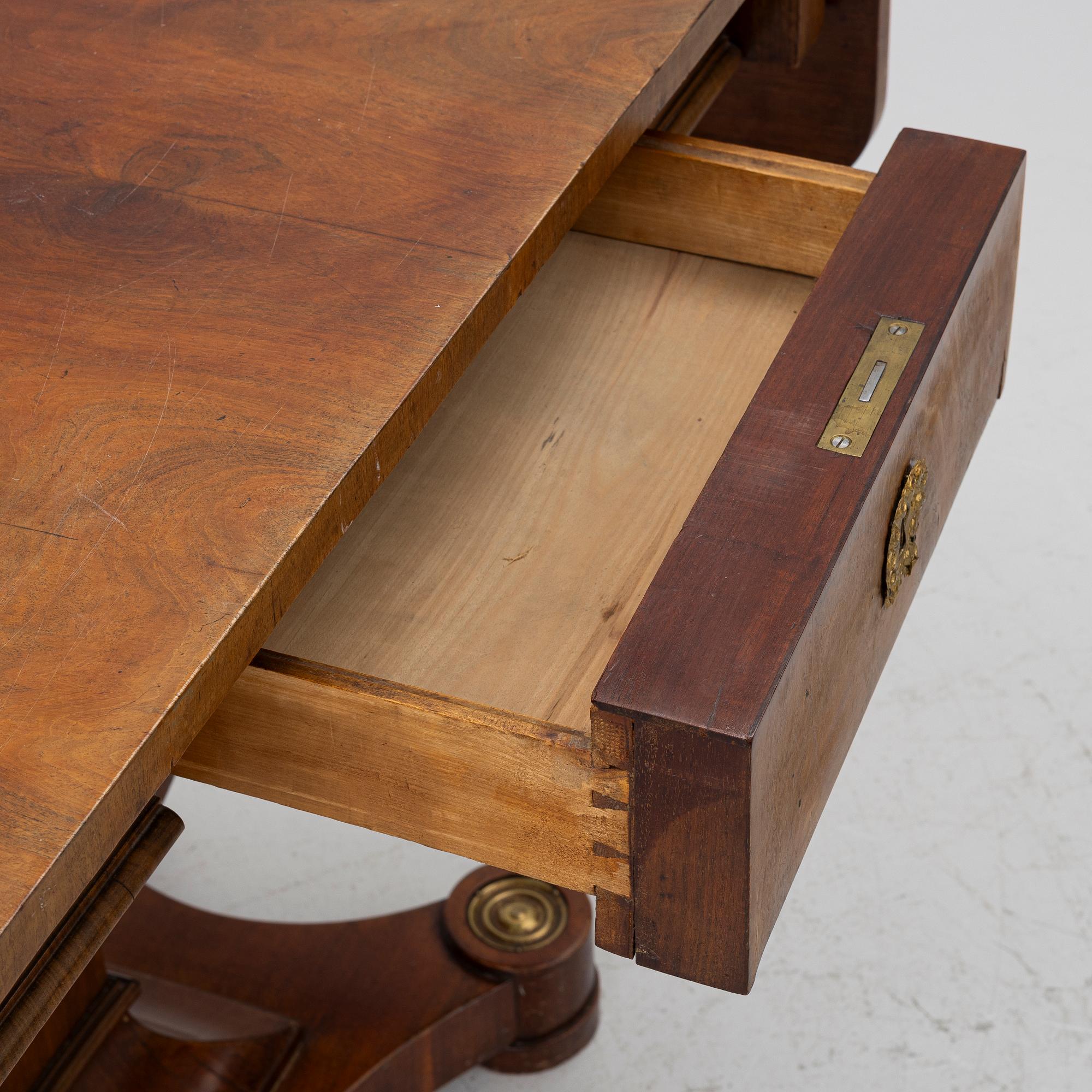 An Empire table, first half of the 19th century.