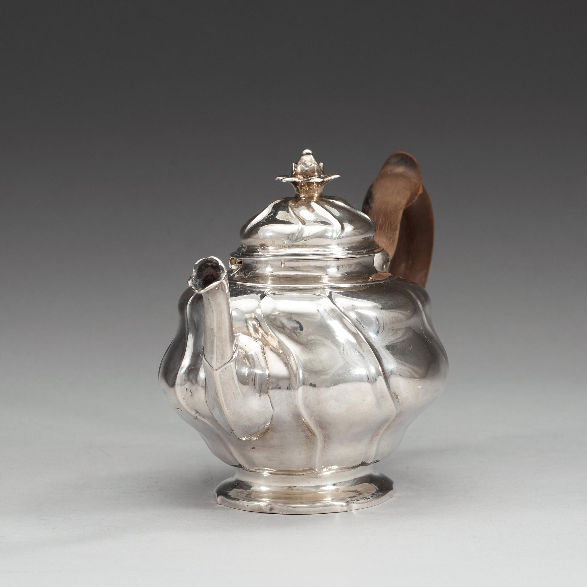 A Swedish 18th century silver tea-pot, makers mark of Jonas Berg, Stockholm 1756.