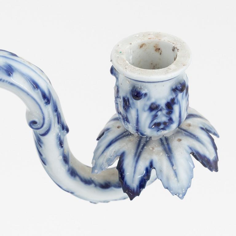 A pair of rococo style porcelain candelabras, Meissen, Germany, early 20th century.