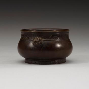 A bronze cencer, Ming dynasty. With Zhengdes six characters mark.