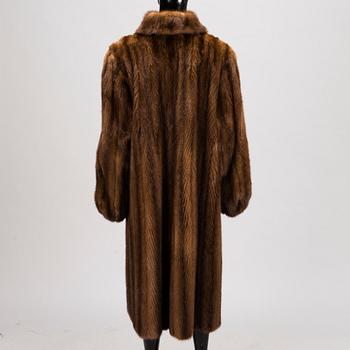 A SAGA MINK FUR COAT.