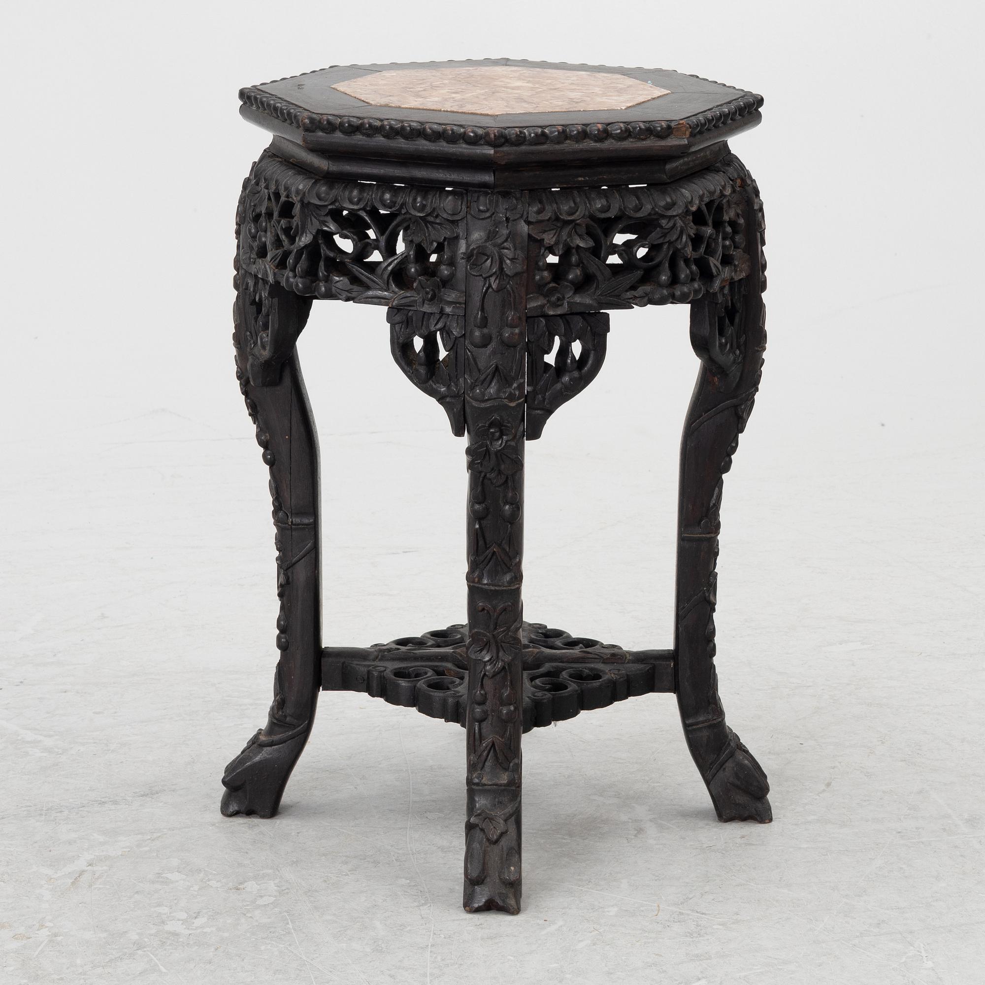 A Chinese small table, carved wood and stone, 1900s.