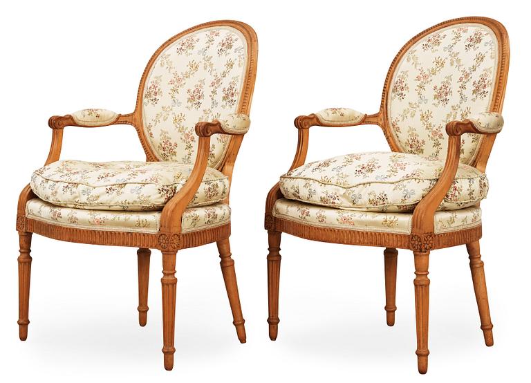 A pair of Louis XVI 18th century armchairs.