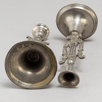 Two pair of Swedish pewter candlesticks, early 19th century and ca 1900.