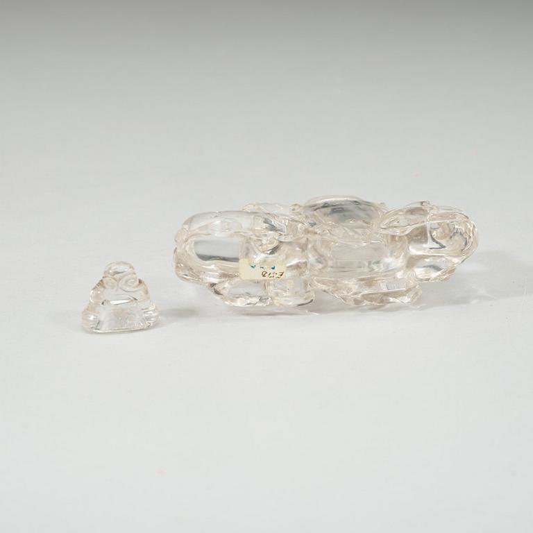 A rock crystal figural group with a vase and cover, presumably late Qing dynasty (1644-1912).