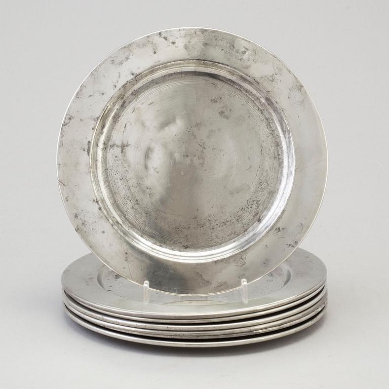 A set of seven 1960s pewter plates by Firma Svenskt Tenn.