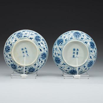 A pair of blue and white lotus dishes, Qing dynasty, Guangxu (1874-1908) marks and of period.
