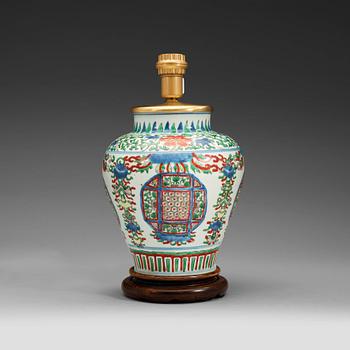 246. A Transitional wucai jar, 17th Century.