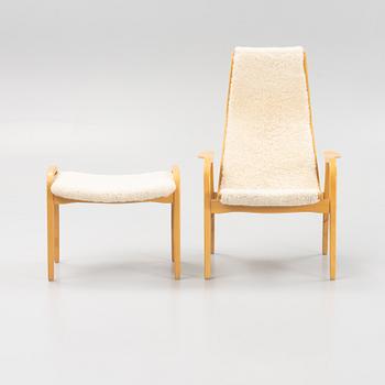 Yngve Ekström, a 'Lamino' armchair and a foot stool, Swedese.
