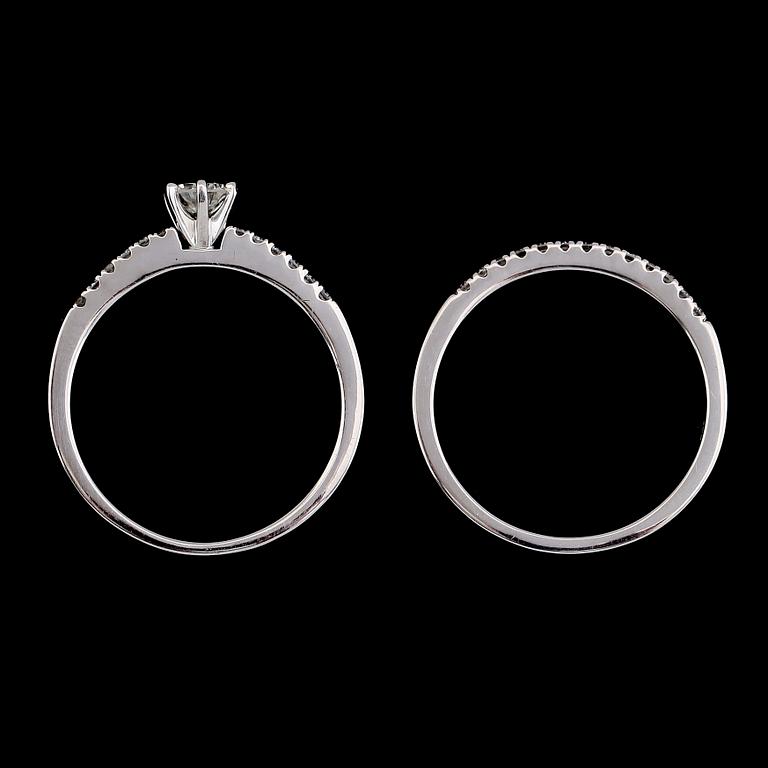 RINGAR, 2 st, 14K vitguld, briljantslipade diamanter tot ca 0.50 ct. Vikt ca 3 g.