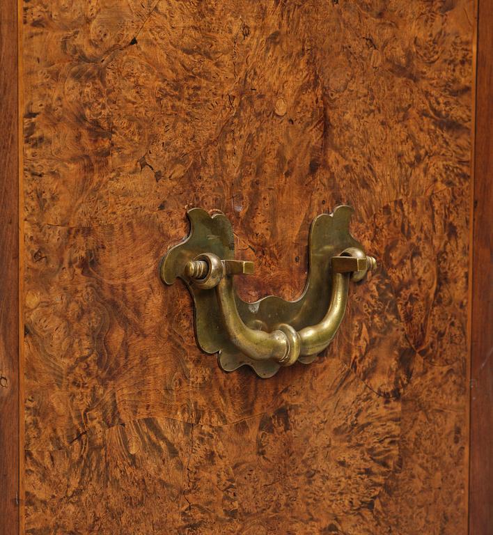 A Swedish late baroque burr-alder cabinet, first part 18th century.