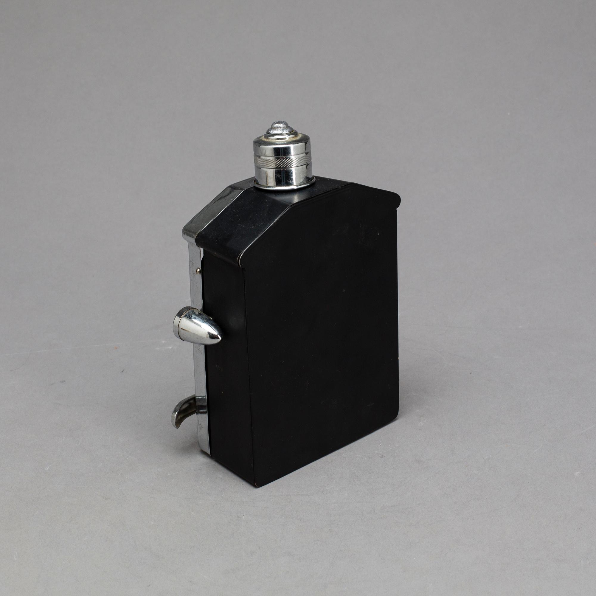 A ROLLS ROYCE MUSIC BOX/DECANTER.