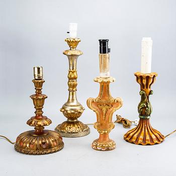 Four mid 20th century wood table lamps from Paoletti, Firenze Italy.