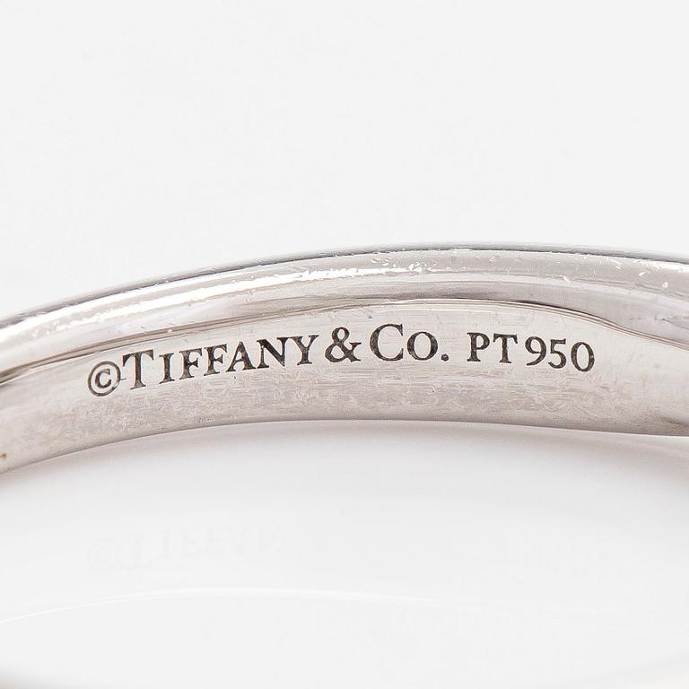 Tiffany & Co, a 'Harmony' platinum ring, with a brilliant-cut diamond approx. 0.17 ct.