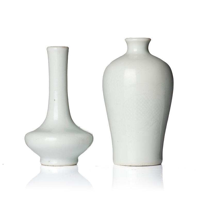 A pair of white glazed vases, Qing dynasty, 18th century.