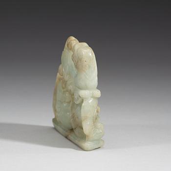 A carved nephrite figurine, presumably late Qing dynasty (1644-1912).