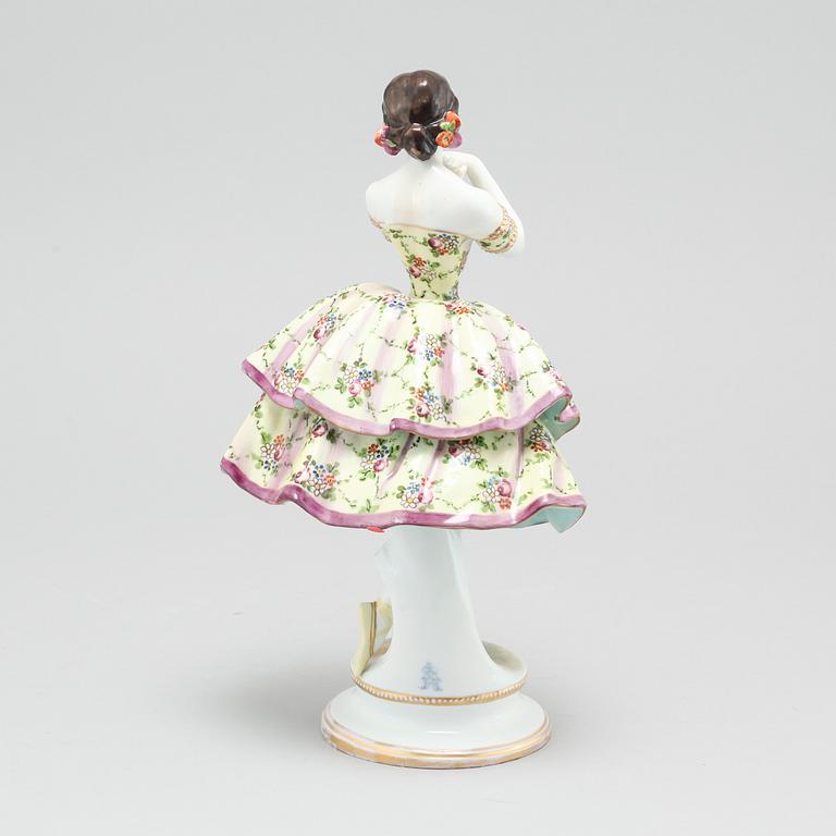 A porcelain figurine by Aelteste Volkstedter Porzellanmanufaktur in Rudolfstadt, made around year 1900.