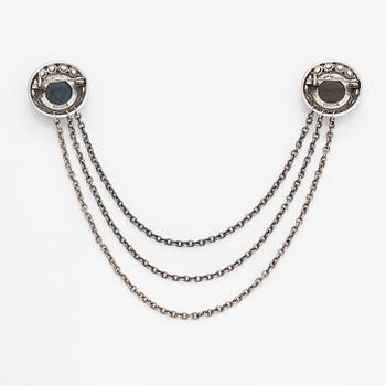 Kai Lindström, A sterling silver collar brooch with granite. Kalevala Koru, Helsinki 1994.