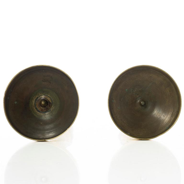 A pair of French Empire candlesticks, early 19th century.