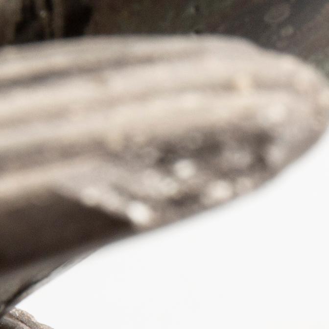 TYRA LUNDGREN, a stoneware sculpture of a bird.