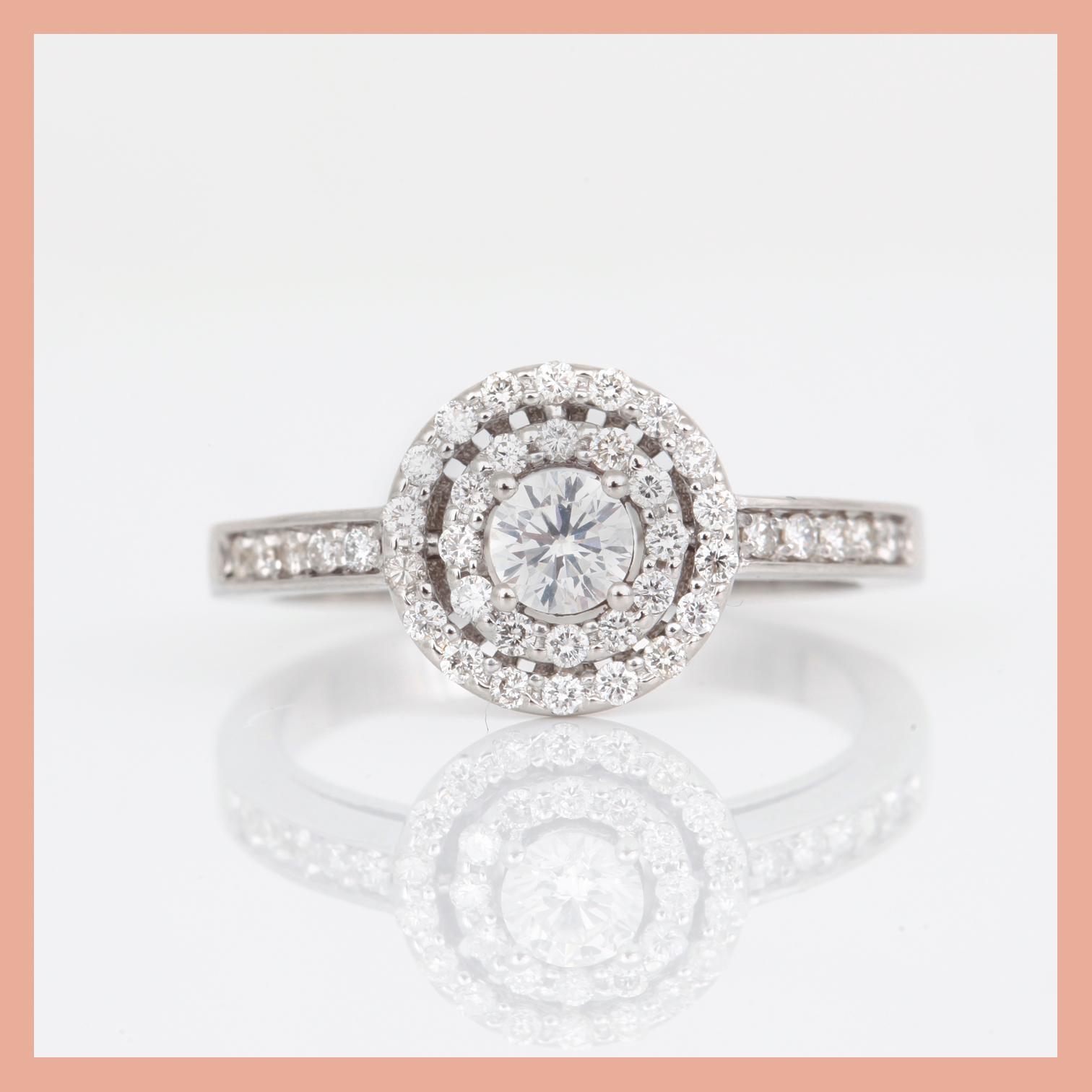 RING, 18K vitguld med briljantslipade diamanter, tot ca 0,66 ct. Total vikt ca 4,66 g.