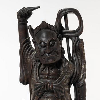 A pair of Chinese hardwood figures, 20th century.