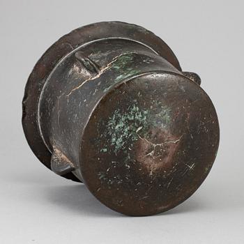 A 15th century bronze mortar.