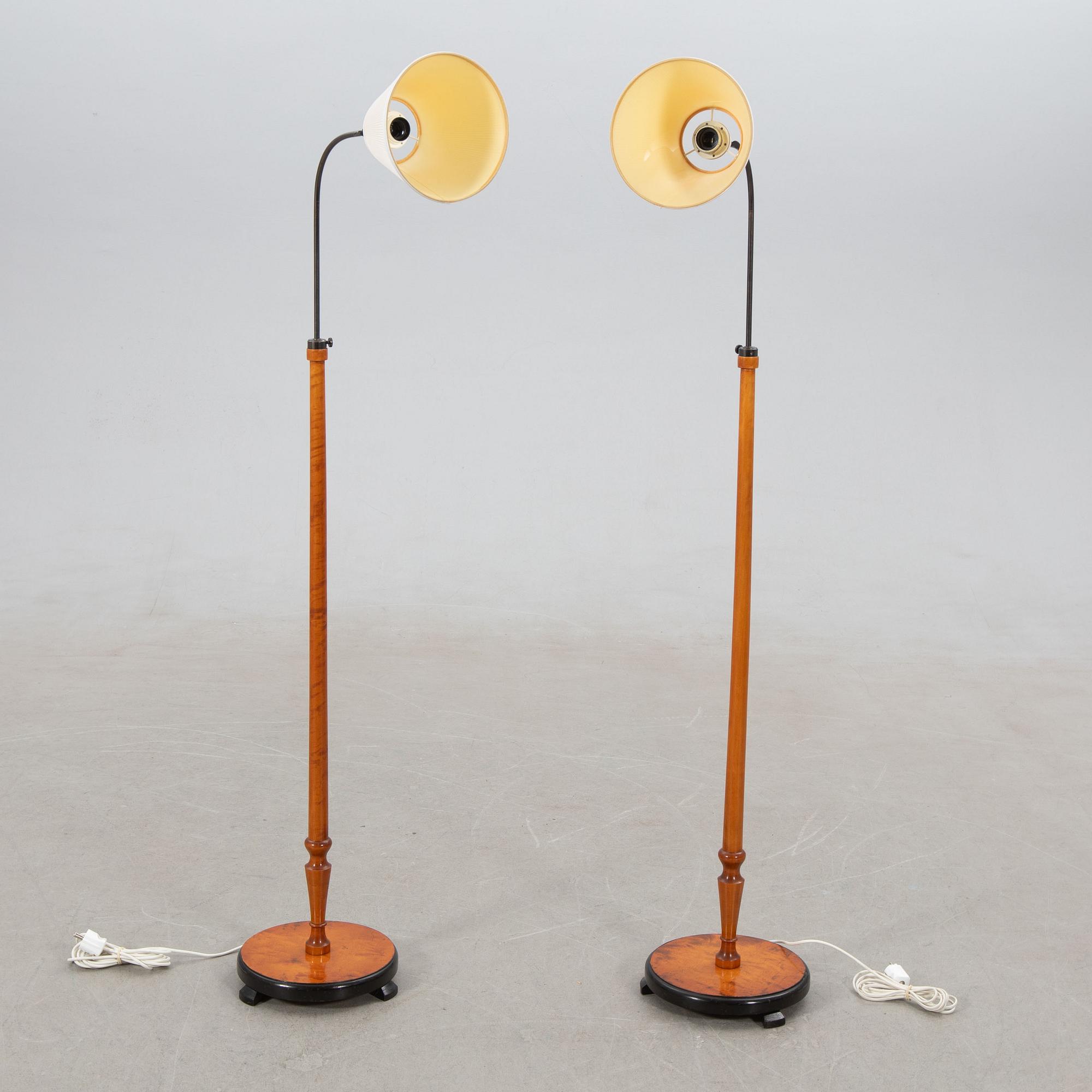 Floor lamps, a pair, 1940s.