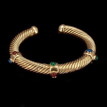 ARMBAND, 18 k guld med färgade stenar, 1900-talets senare hälft, vikt 35,5g.