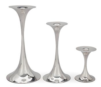 304. Tapio Wirkkala, A SET OF THREE CANDLESTICKS.