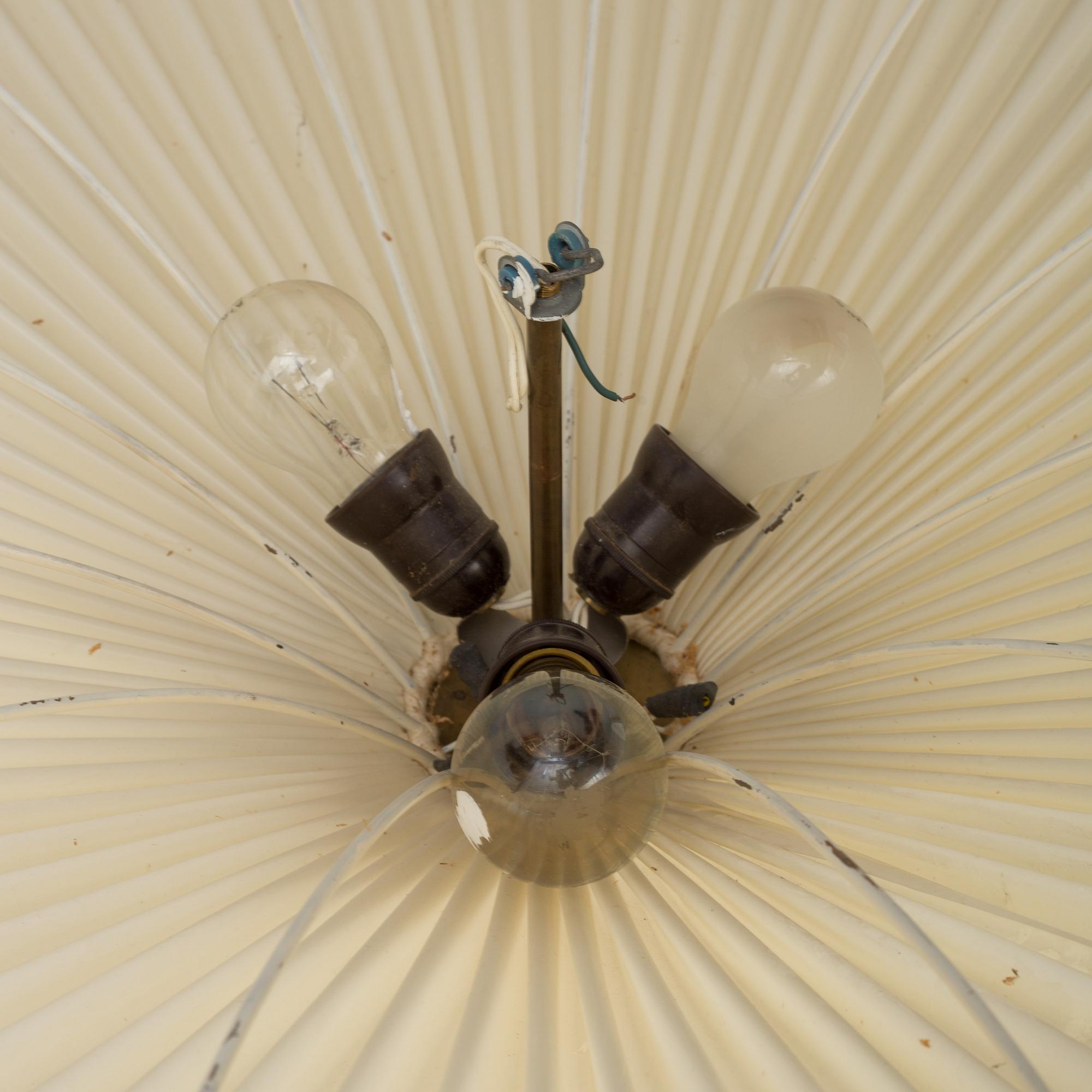 Two first half of the 20th century ceiling lights.