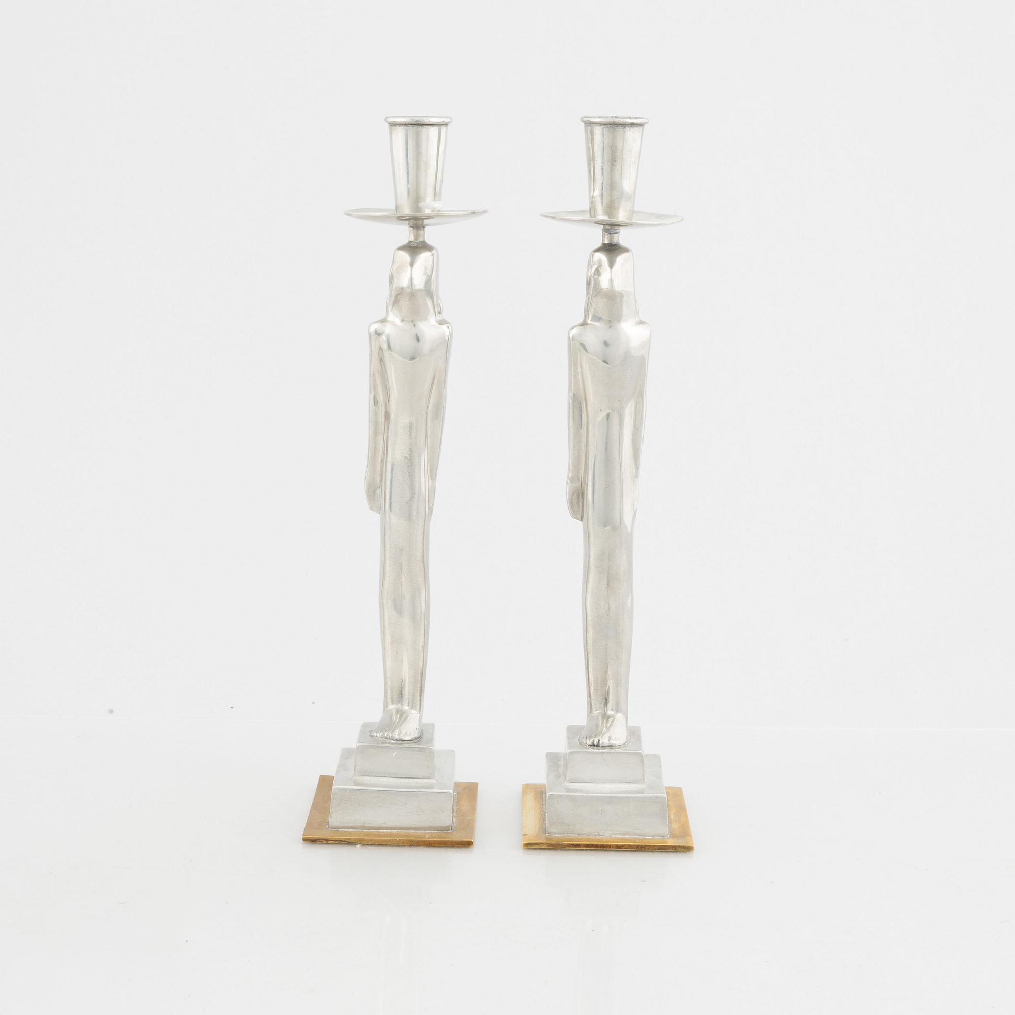 Edvin Öhrström, a pair of 'Egyptian' candlesticks, Firma Svenskt Tenn 2001.