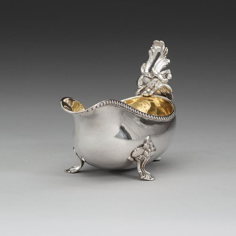 A Swedish 18th century parcel-gilt cream-jug, makers mark of Lars Hessling, Linköping 1778.