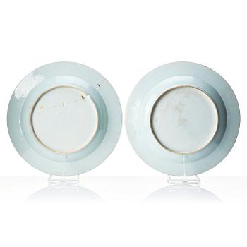 A pair of monogrammed chargers, Qingdynasty, Qianlong (1736-95), dated 1741.