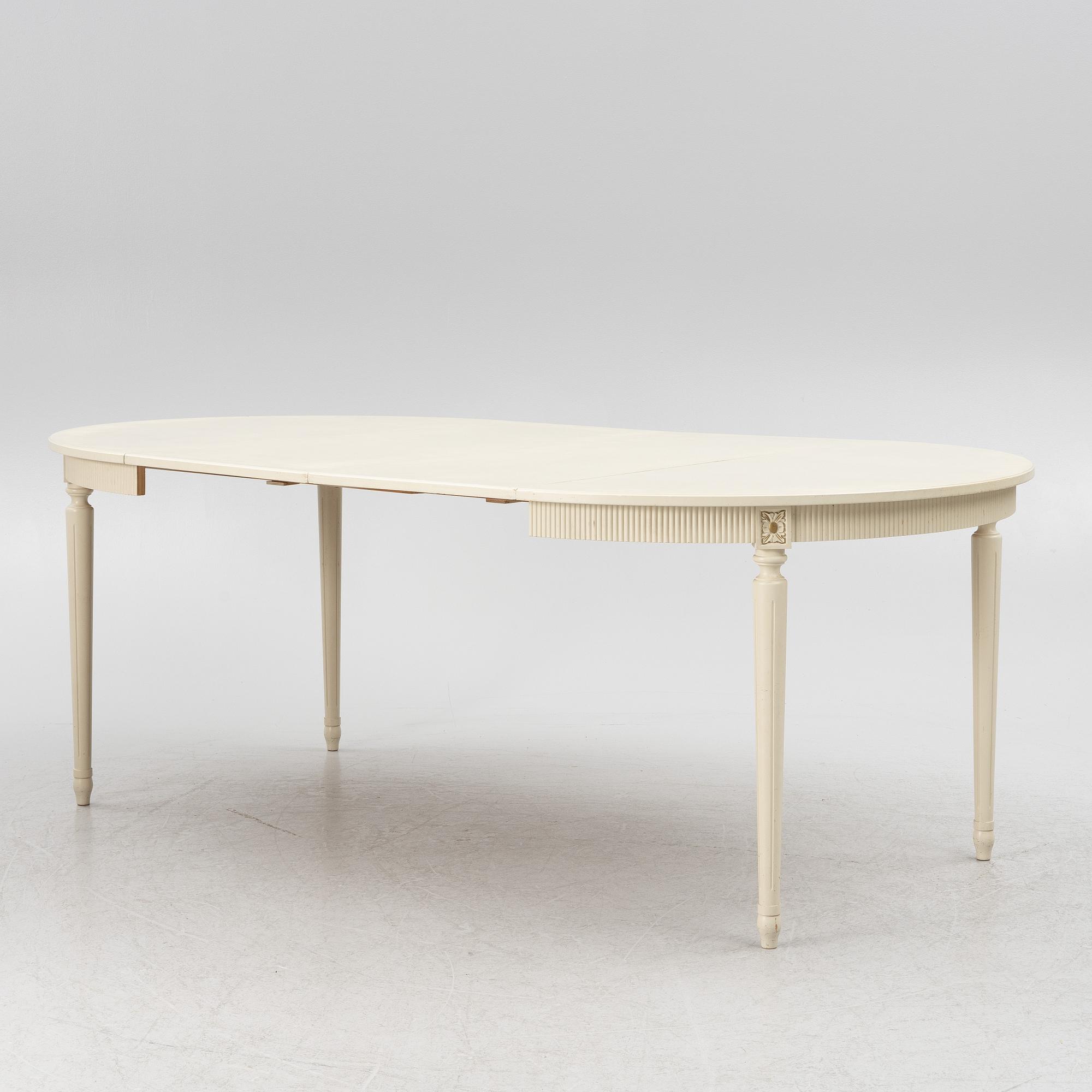 Dining table with six chairs, Gustavian style, second half of the 20th Century.
