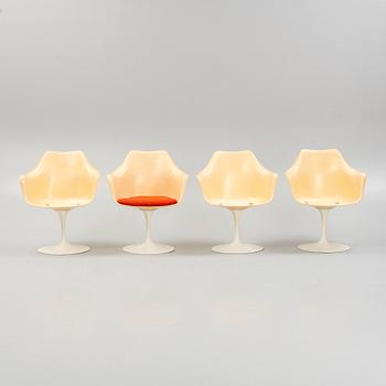 Eero Saarinen, four "Tulip" chairs, Knoll International, and a table.