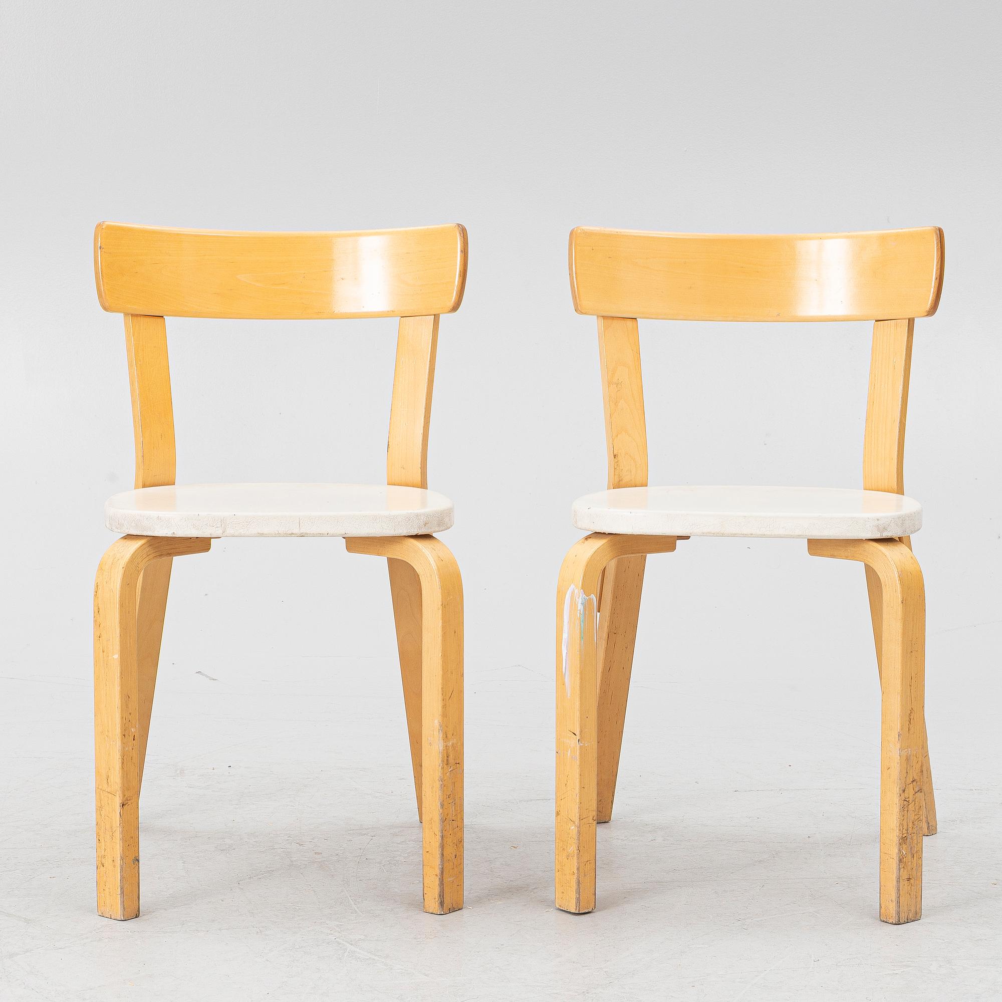 Alvar Aalto, a pair of model 69 chairs, Finland, second half of the 20th century.