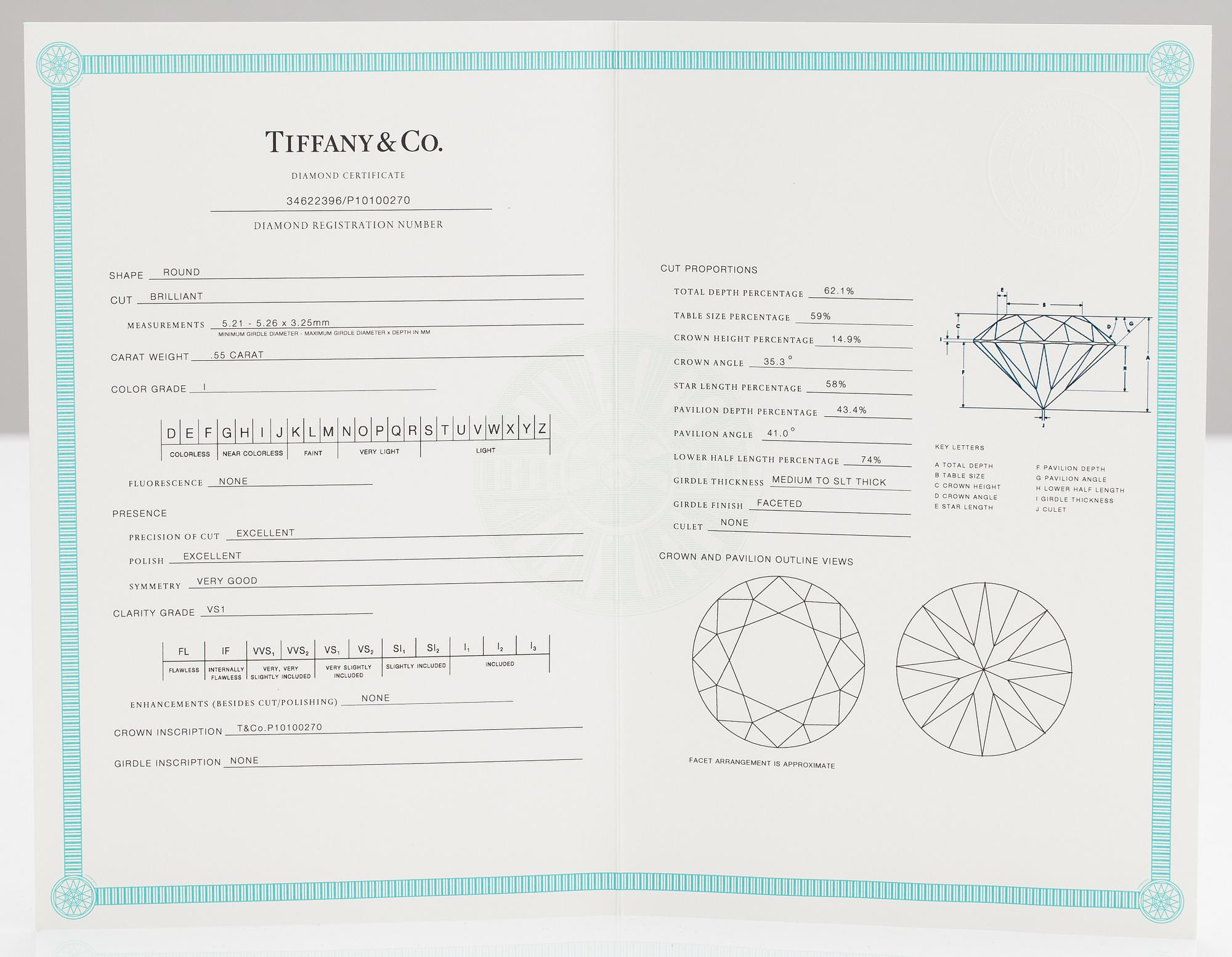 Tiffany & Co, A platinum ring with a ca. 0.55 ct diamond.