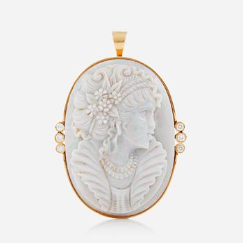 1254. A carved opal cameo pendant/brooch with brilliant-cut diamonds total carat weight circa 0.40 ct.