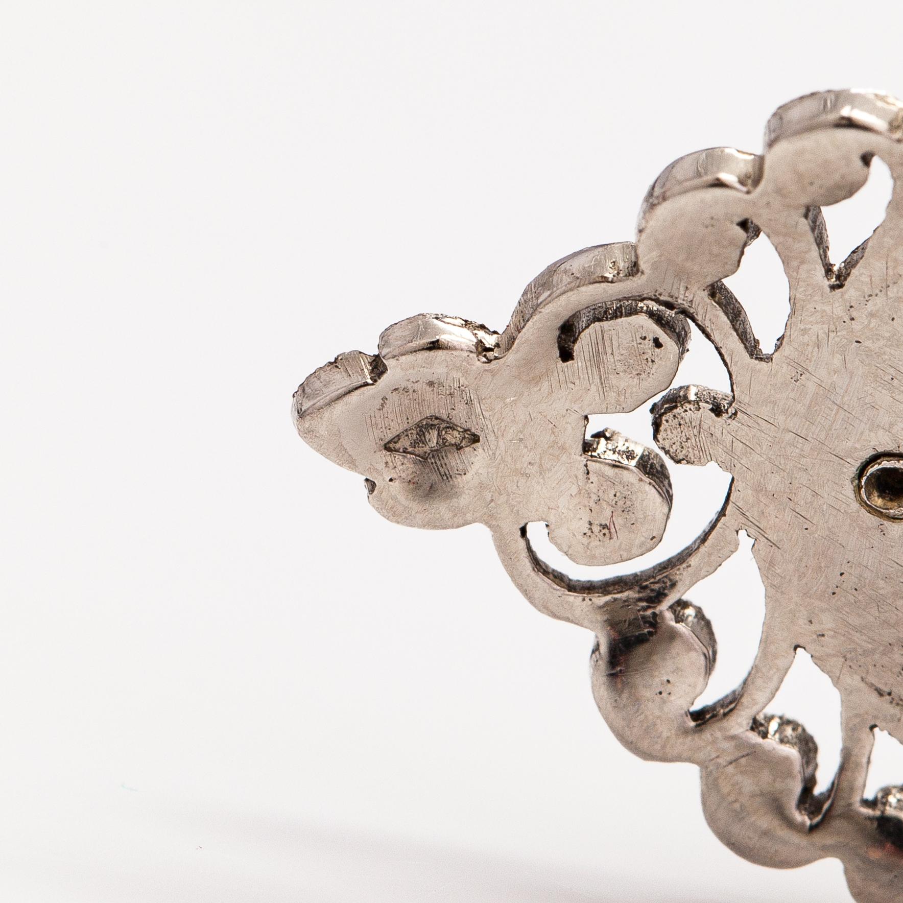 A necklace and a pair of earrings made of silver with enamel and marcasites. Paris, turn of the 20th century.