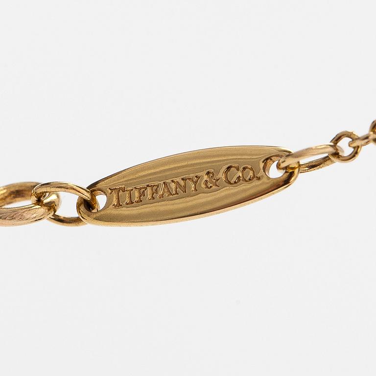 Tiffany & Co, Elsa Peretti, an 18K gold 'Diamonds by the Yard' necklace with a brilliant-cut diamond.